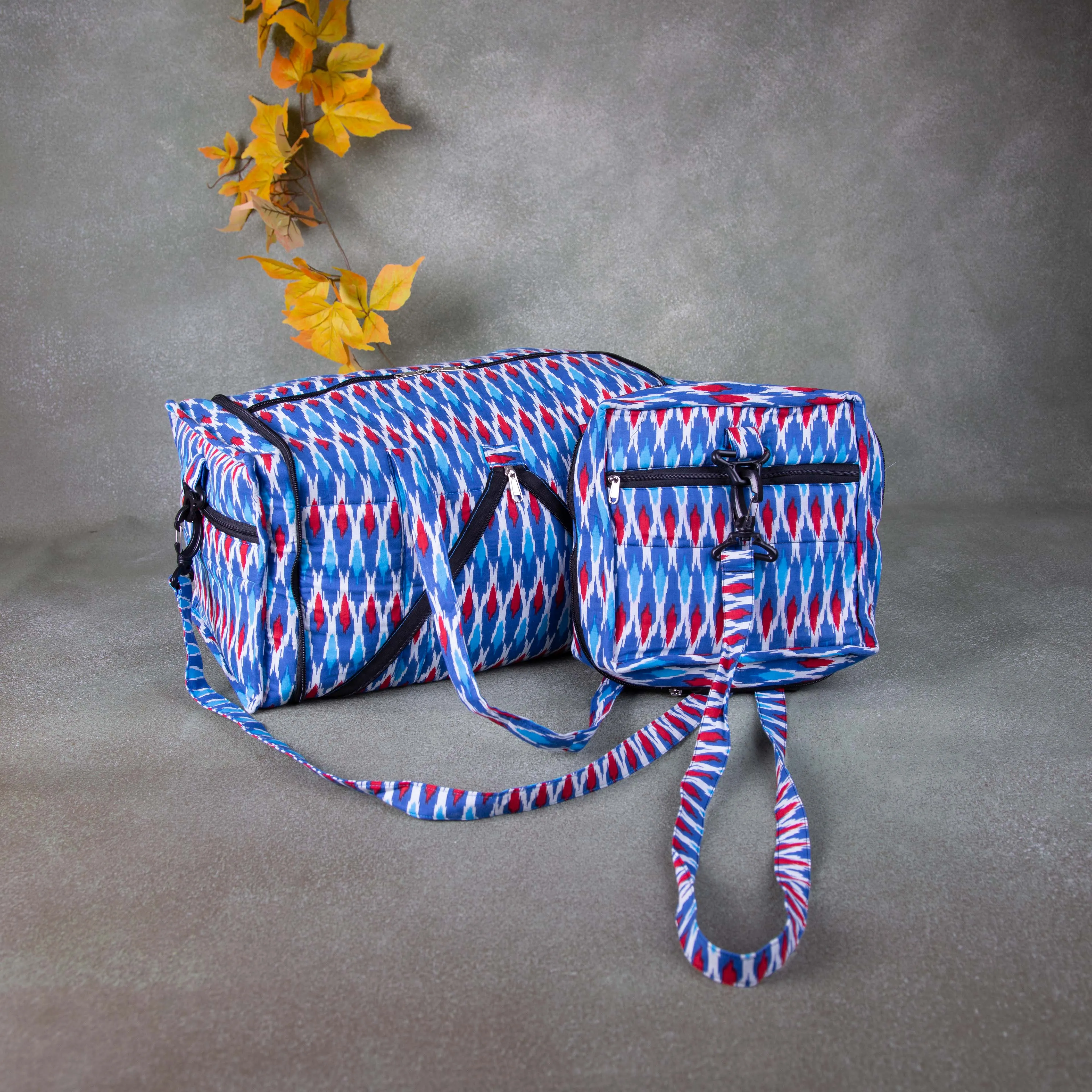 Expandable Travel Bag Blue with Red Ikat Prints.